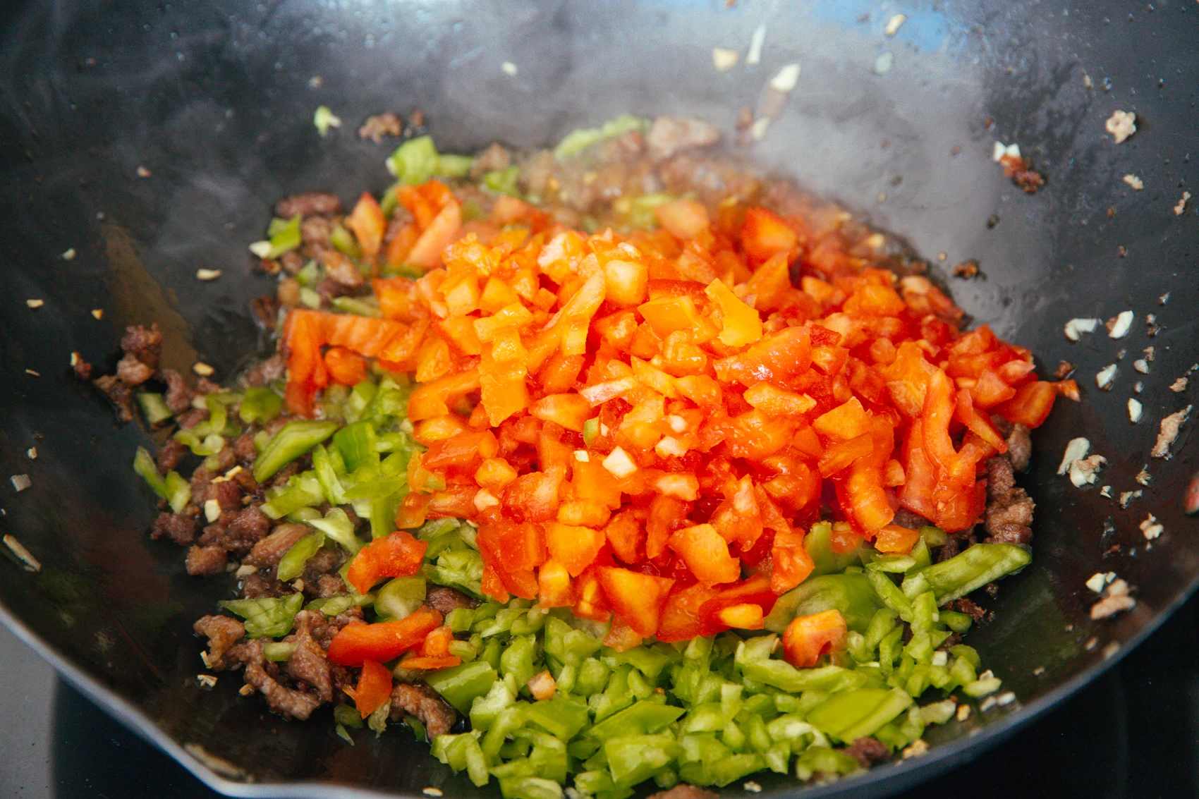 pork and tomato stir fry